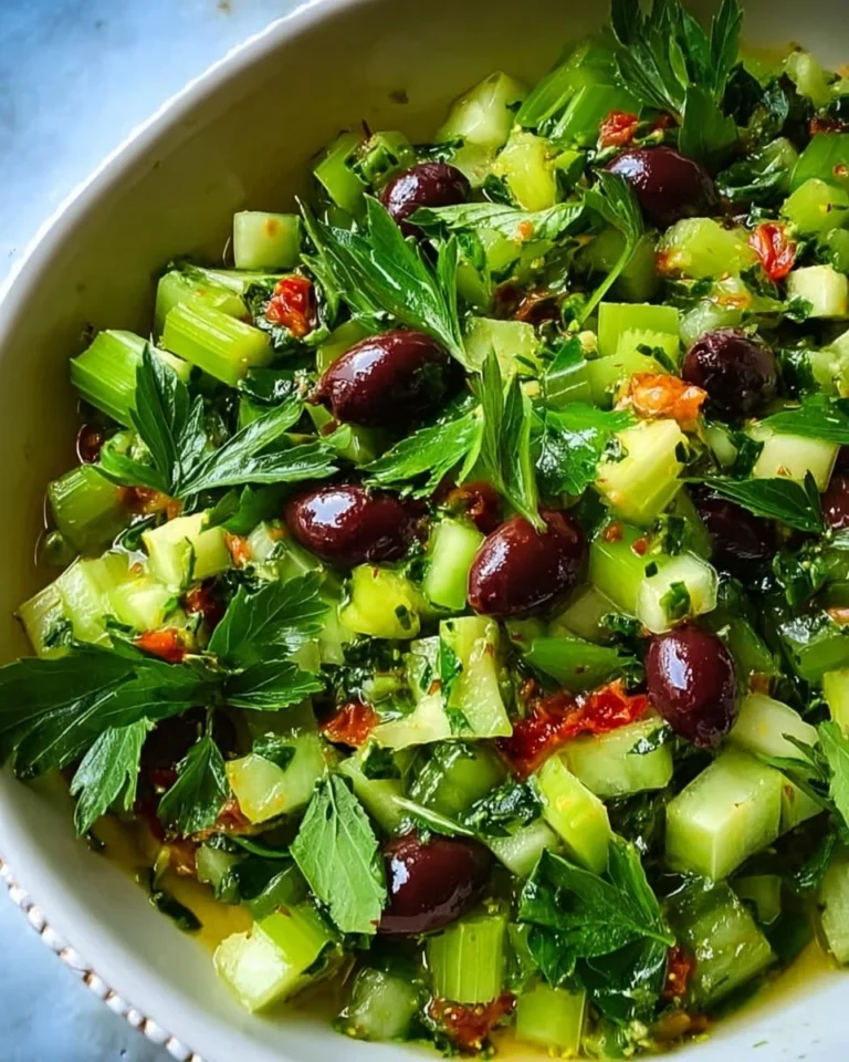 Bowl of Olive Mediterranean Celery Salad with fresh ingredients