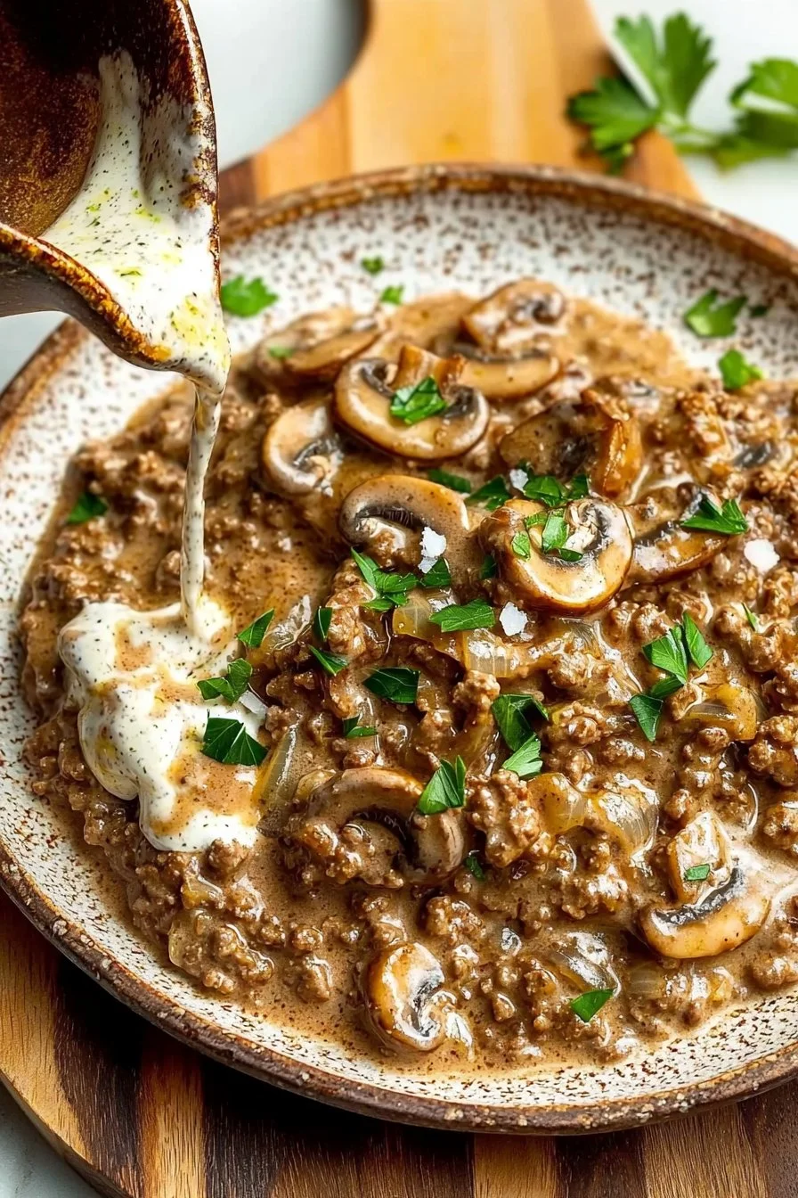 Keto Ground Beef Stroganoff served in a bowl with mushrooms and herbs